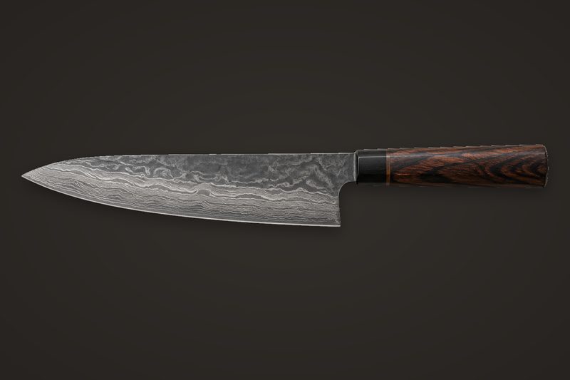 A 210 mm gyuto with a damascus blade and a dark ironwood handle